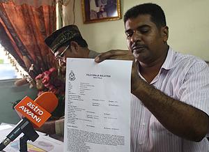 penang tanjong tokong folks against uda 220111 villager shows police report