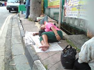 beggars in Penang during chinese new year