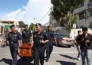ghani sent coffin to lim guan eng ng wei aik 120311 police move away coffin