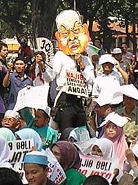 petrol price hike protest 2 100306 dancing najib
