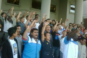 anwar ibrahim sodomy II trial decison on prima facie supporters outside court front