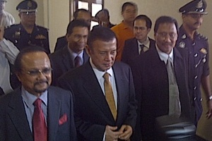 datuk t charged in court front