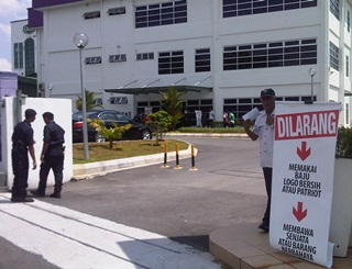 banner outside karangkraf building ambiga debate EC wan ahmad bersih