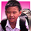school boy with a heavy school bag