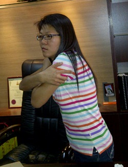 Wong bee fong demonstrating how the cops were touching her