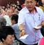 Ibrahim Ali handing out angpow