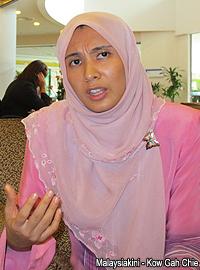 teo nie ching and nurul lodge report mcmc over anwar obscene mms 260312 nurul