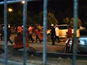 captured heckler in pakatan ceramah in kuala selangor being led away