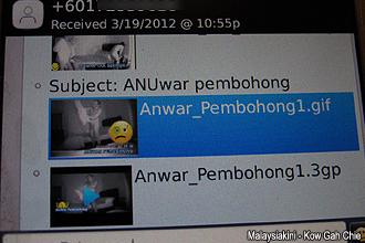 teo nie ching and nurul lodge report mcmc over anwar obscene mms 260312 05