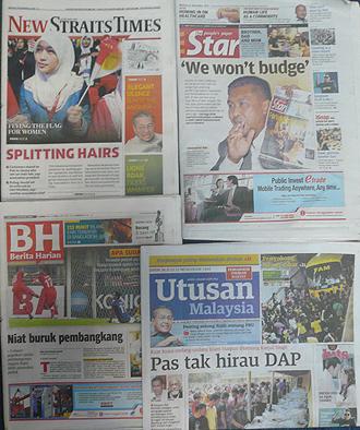 malay and english newspapers frontpage 261112