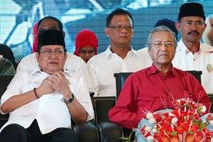 Perkasa president Ibrahim Ali and former Prime Minister Dr Mahathir Mohamad front