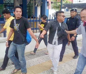 ekhsan bukharee (right) and friend 505 flash mob participants arrested