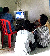 chin refugee centre 141206 watching tv