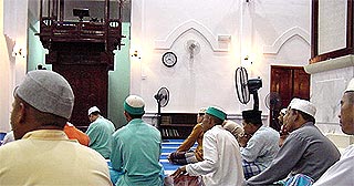 mosque masjid people in the mosque hearing the cheramah