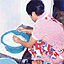 indonesian maid washing plates