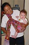 indonesian maid taking care of a chinese baby 201206