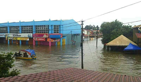 Young mum wades through Kemaman flood to save newborn