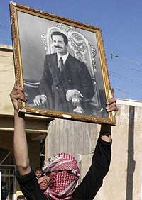 saddam hussein execution death 030107 poster of saddam
