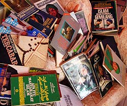 rufaqa raid 010307 ashaari book pile