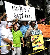 mtuc minimum wage salary protest 080807 banner