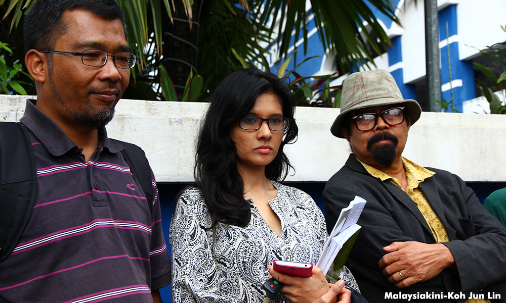 Cops probe activist for bringing daughter to Bersih rally
