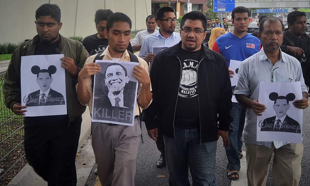 Kedatangan Obama disambut dengan protes TPPA