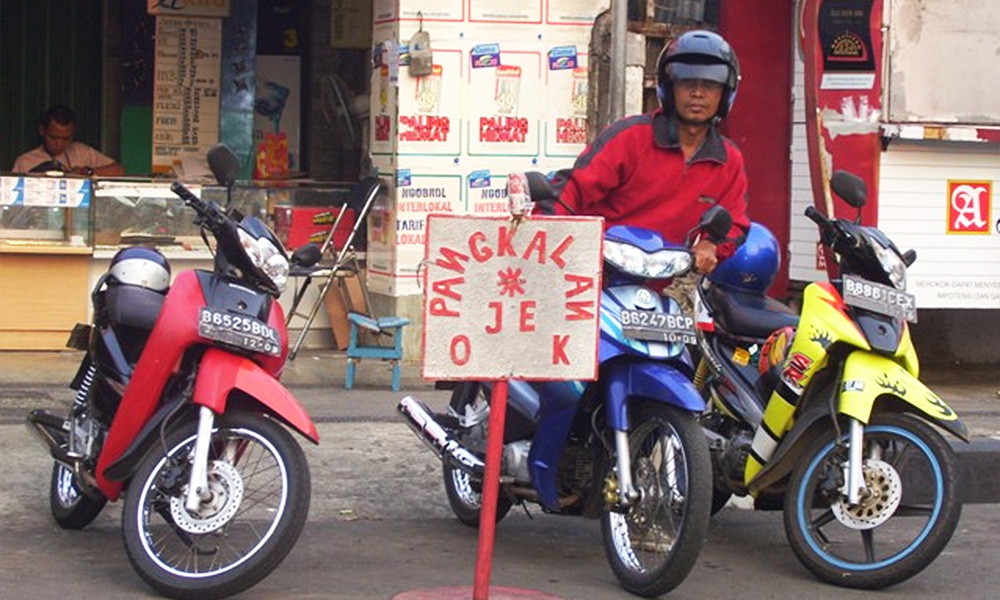 Armpit sniffers do odour test on motorcycle taxi drivers