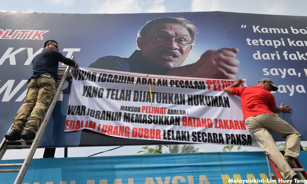 #BebasAnwar cries arson over threat to 'Save Anwar' billboards