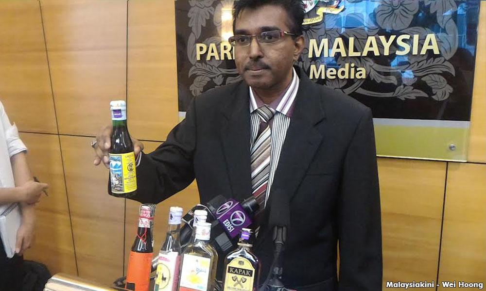 MP brings liquor to Parliament to highlight gov't inaction