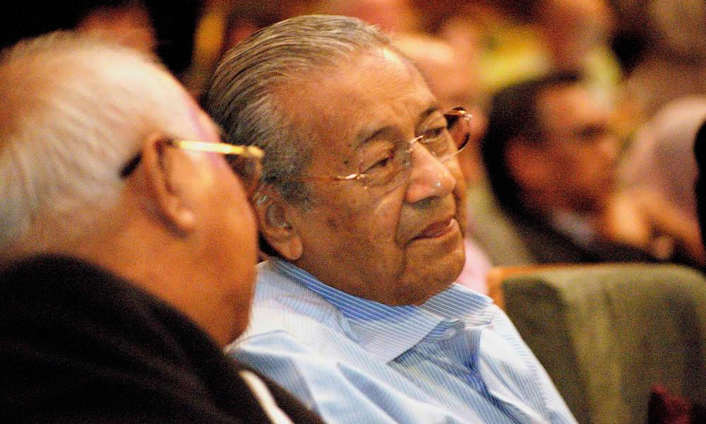 Dr M denies urging foreign intervention