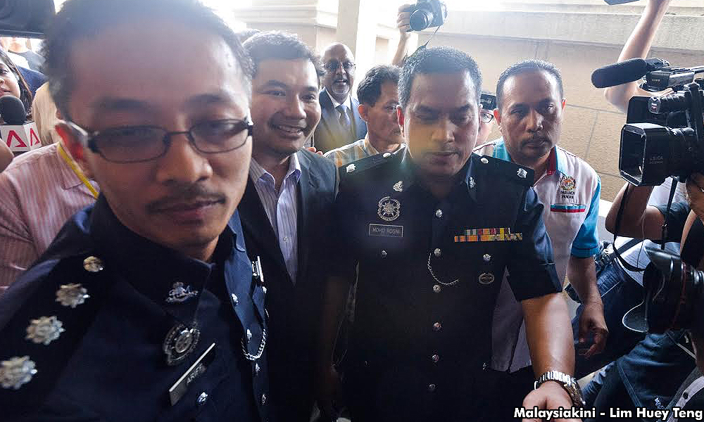 Rafizi charged under OSA, claims trial