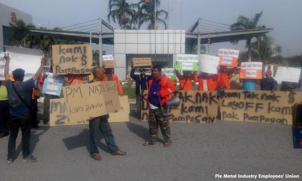 'Help us, Najib' placards flashed at steel workers’ picket